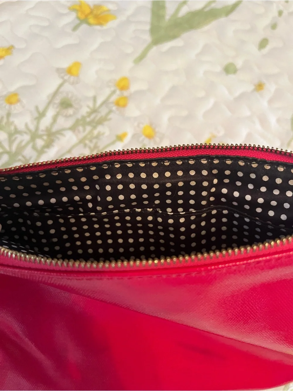 kate spade red travel pouch with gold logo plate